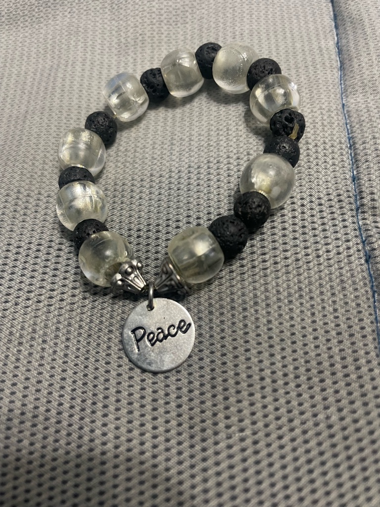 Peace Charm Clear And Black Beaded Stretch Bracelet